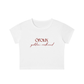 A white short-sleeve crop top t-shirt with 'oroux golden redhead' printed in red across the chest, shown on a plain white background.