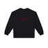 Model pairing the oversized Badass Redhead sweatshirt with casual bottoms