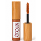A strawberry blonde brow gel by oroux Skin, shown with its bamboo-textured cap off and the applicator wand standing beside it on a white background.