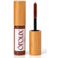 A bottle of oroux Skin auburn copper brow gel with bamboo-style packaging next to its applicator wand showing the brown gel on the brush, on a white background.