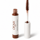 A bottle of Oroux Skin Long & Roux Peptide Mascara for redheads with its applicator wand shown beside it on a clean white background.