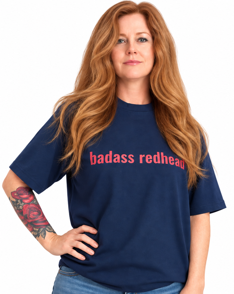 A split-screen lifestyle image of a woman with long red hair modeling a navy blue t-shirt. The left side shows her from the waist up with her hand on her hip, and the right side shows a closer cropped view of her flexing her arm.